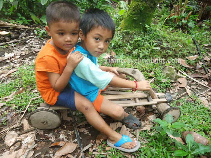 kids in ligiron, contraption like wooden bike, four wheels, Valencia, Negros Oriental