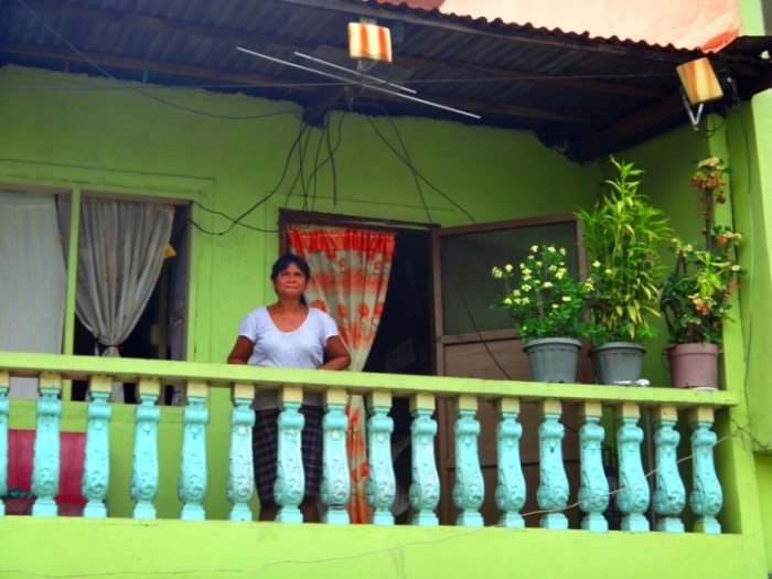 An Estero de Paco resident looks on