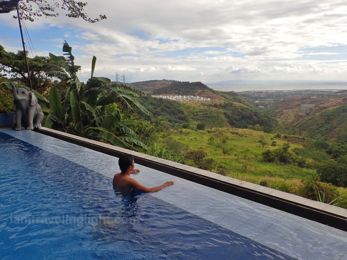 man at infinity pool, luljetta's hanging gardens and spa, antipolo, breathtaking view of rizal and metro manila.jpg