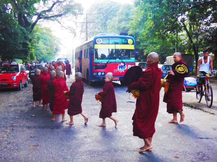 Buddhist monks crossing the street, Buddhist monks stop traffic, yangon, myanmar