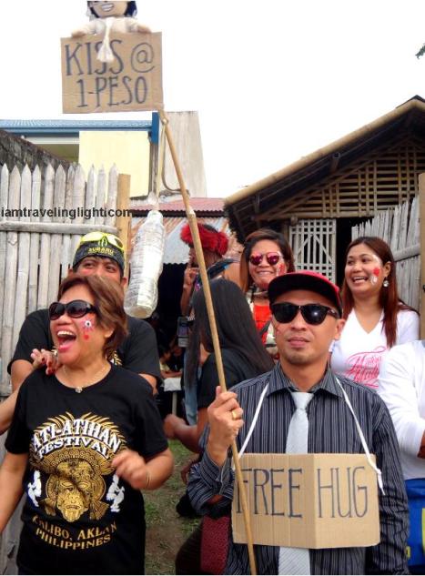 free hug, one-peso kiss, Kalibo Ati-atihan Festival 2014 merrymaking, revelry, parade