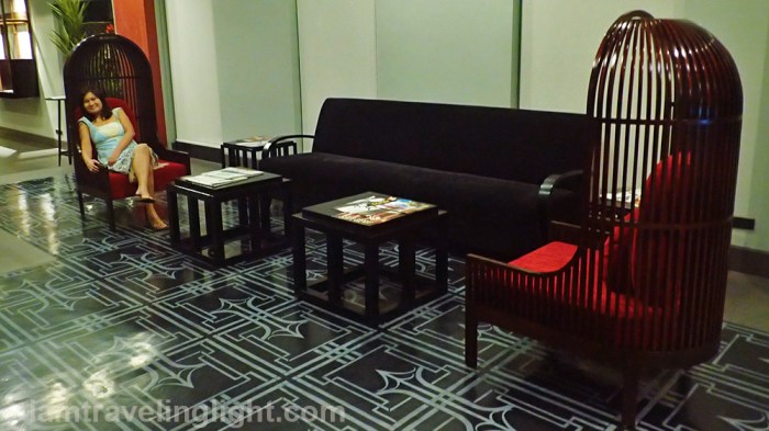 sofa nest, couch, red accent, wooden frame, lobby, relaxing, Amelie Hotel Manila, Malate.jpg