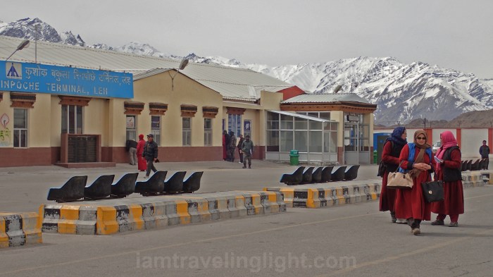 leaving the airport, ladakhi women in traditional attire, ladakh, winter, snowcapped mountains, kushok bakula rinpoche airport, leh, india.jpg