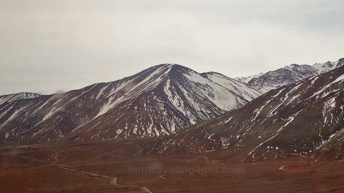 Leh town landing, almost landed, Himalayas, snowcapped mountains, winter, view from plane, flight to Leh Ladakh, Kashmir, from New Delhi, India.jpg