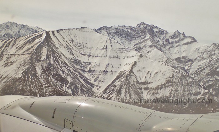 Leh town landing, Himalayas mountains at close range to plane,, snowcapped, winter, view from plane, flight to Leh Ladakh, Kashmir, from New Delhi, India.jpg