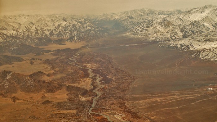 Leh town, river from above, Himalayas mountain range, snowcapped mountains, winter, view from the plane, flight to Leh Ladakh, Kashmir, from New Delhi, India.jpg