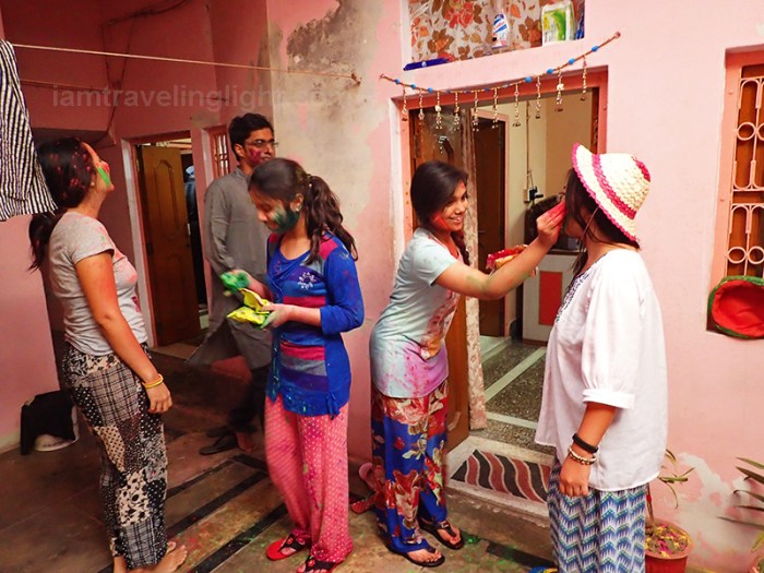Holi, Festival of colors, local's home, smearing paint, Mathura, India.JPG