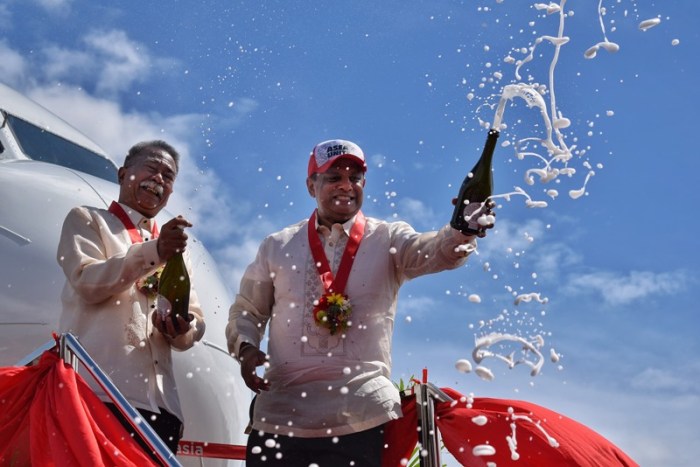 AirAsia group CEO Tony Fernandes, champagne ceremony, ASEAN 50 years anniversary, livery, AirAsia plane, I love ASEAN plane