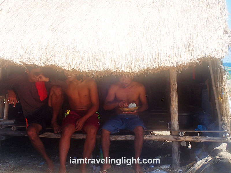 Fisherfolk taking a break in a hut at Pulupandan