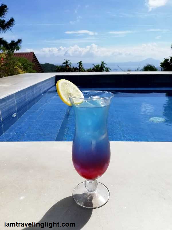 airasia sunset bursts drink berry and lychee by the pool