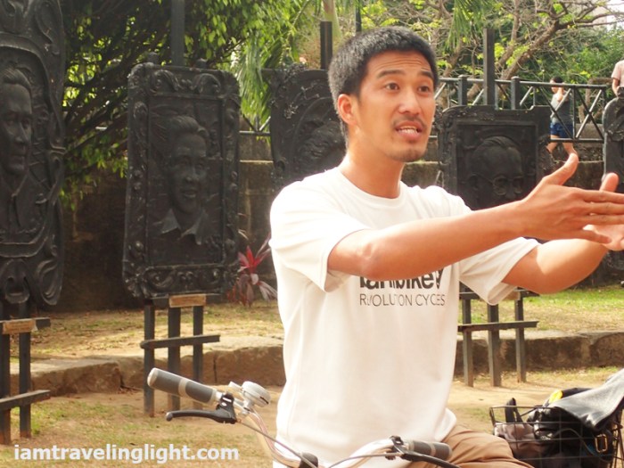 Bambike guide explaining, bamboo bike tour, eco-friendly tour, Intramuros, Manila.JPG