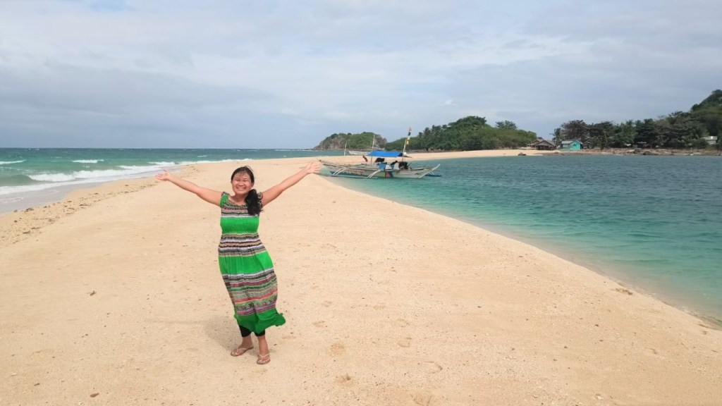 Walking on Bantigue Island sandbar
