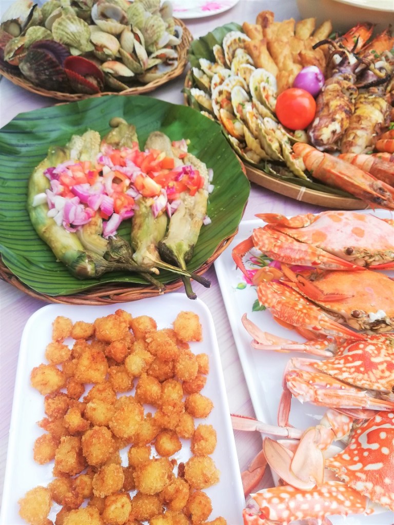 Seafood lunch buffet on our second trip - scallops, crabs, shrimps, roasted eggplant, and more